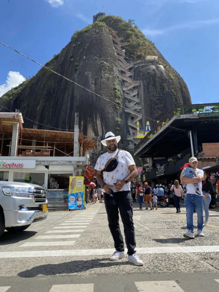 Wid in front of El Peñol rock in Guatapé, 2021